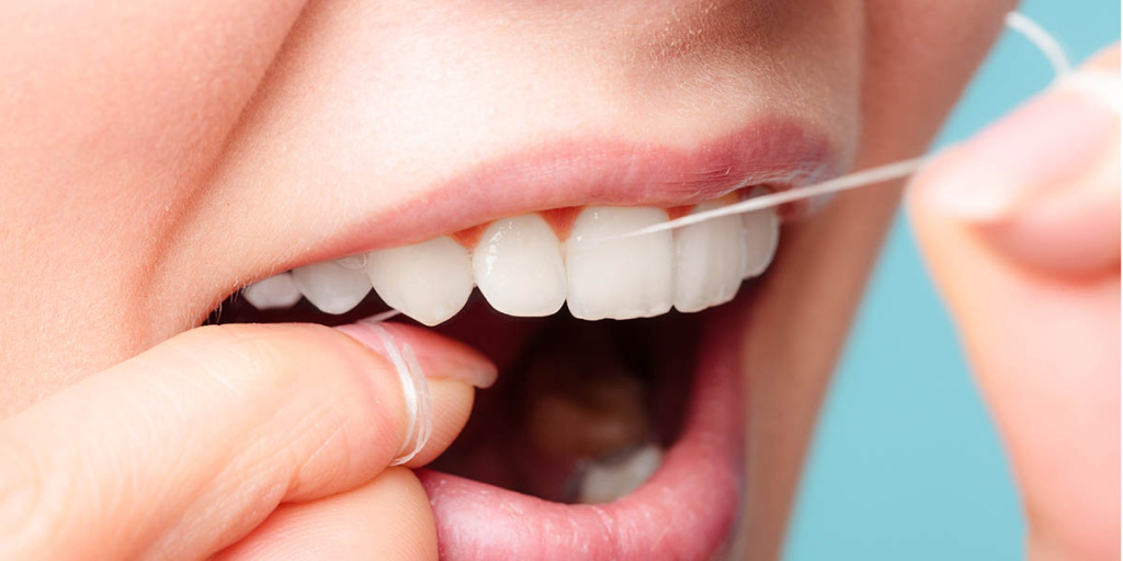 Польза и вред зубной нити