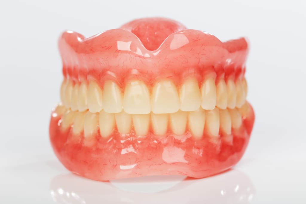 Особенности и виды силиконовых зубов