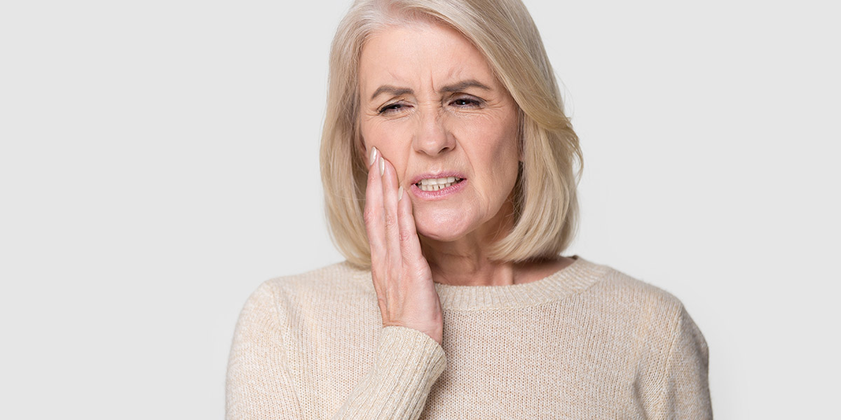 Болит челюсть: причины, симптомы, лечение