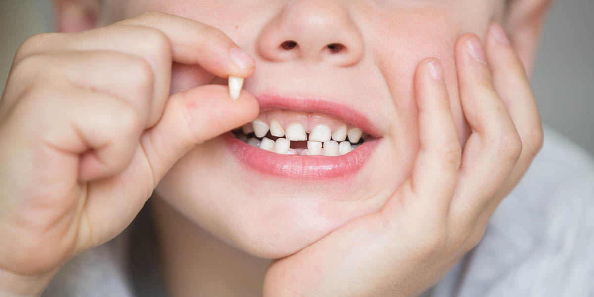 Выпадение молочных зубов у детей